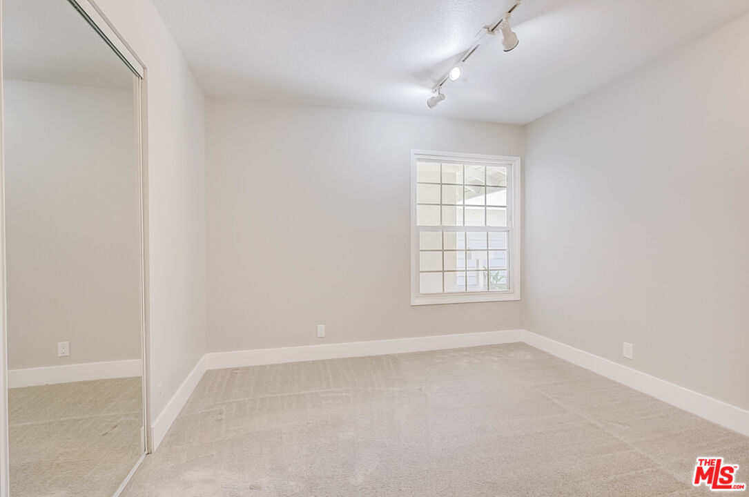 19412 Old Ranch Road Yorba Linda, CA 92886 - Photo 21 of 35 an empty room with a window