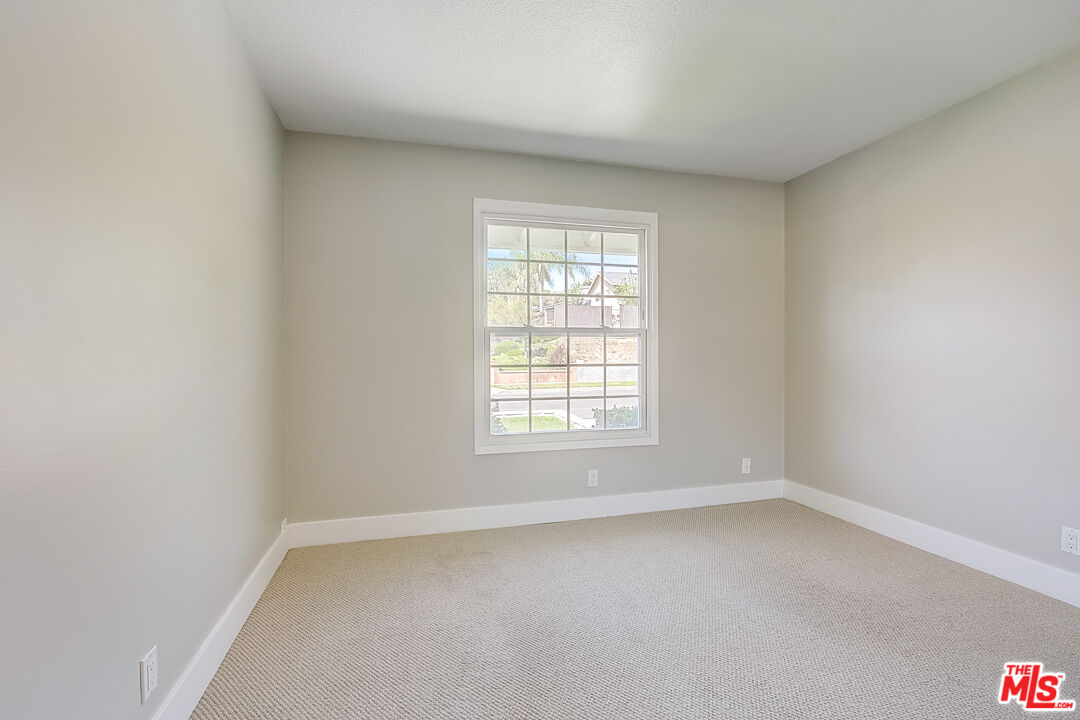 19412 Old Ranch Road Yorba Linda, CA 92886 - Photo 24 of 35 an empty room with a window