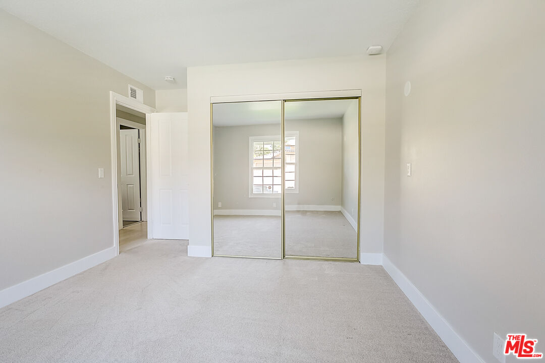 19412 Old Ranch Road Yorba Linda, CA 92886 - Photo 28 of 35 a view of an empty room with a window