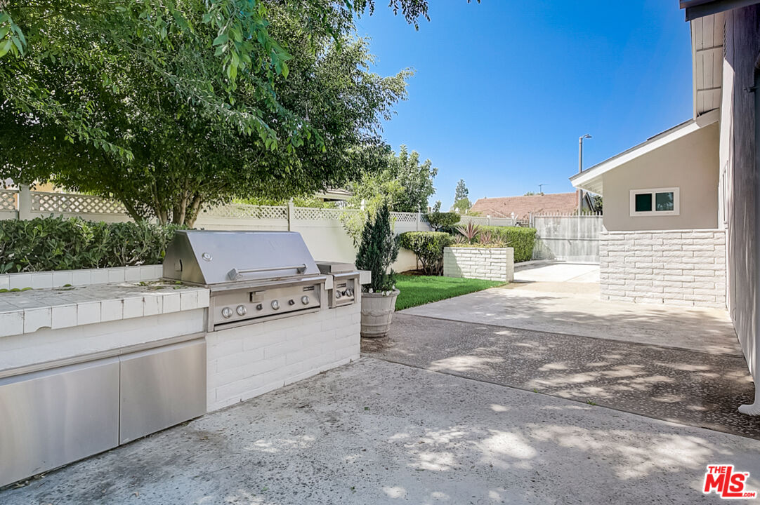 19412 Old Ranch Road Yorba Linda, CA 92886 - Photo 29 of 35 a view of a backyard with dishwasher and stove