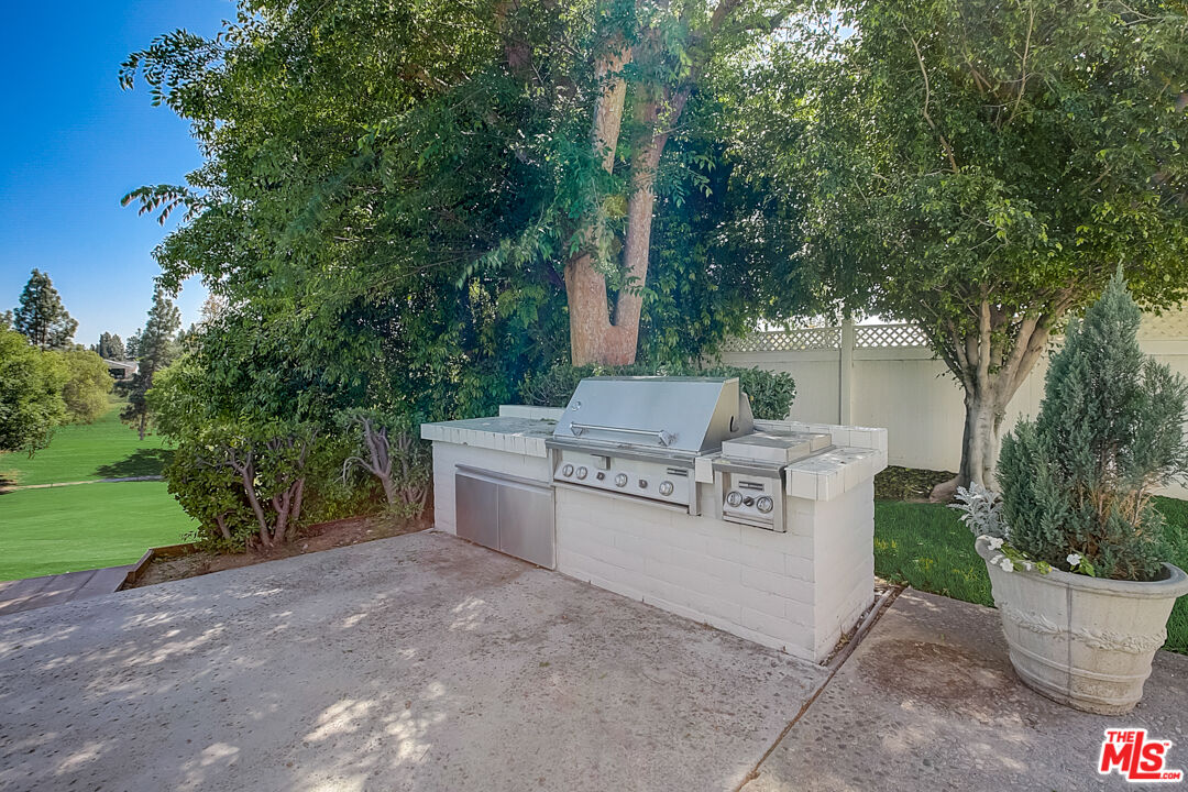 19412 Old Ranch Road Yorba Linda, CA 92886 - Photo 30 of 35 a view of a chairs and table in the backyard