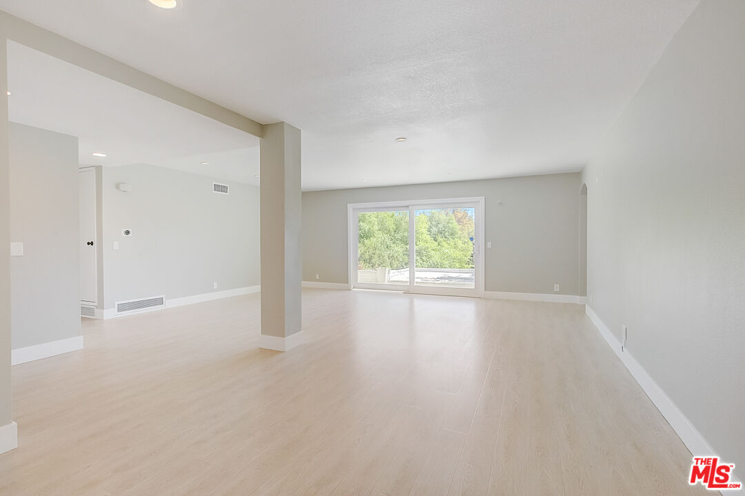 19412 Old Ranch Road Yorba Linda, CA 92886 - Photo 5 of 35 an empty room with windows