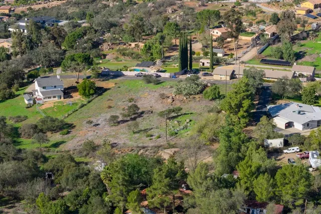 an aerial view of residential house with outdoor space