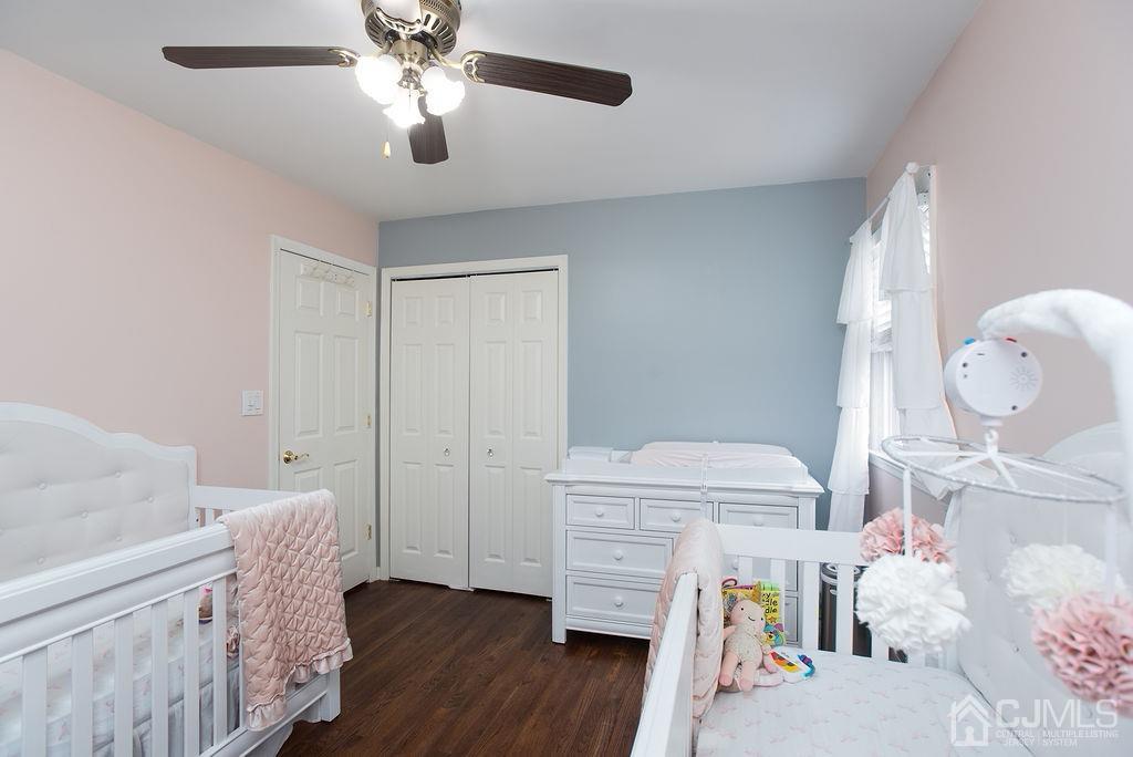 18 Layne Road Somerset, NJ 08873 - Photo 14 of 22 a bedroom with a bed and wooden floor