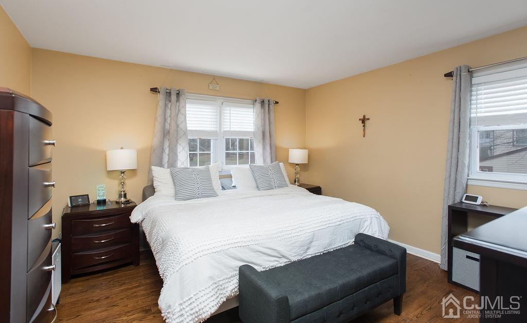 18 Layne Road Somerset, NJ 08873 - Photo 16 of 22 a bedroom with a bed and wooden floor