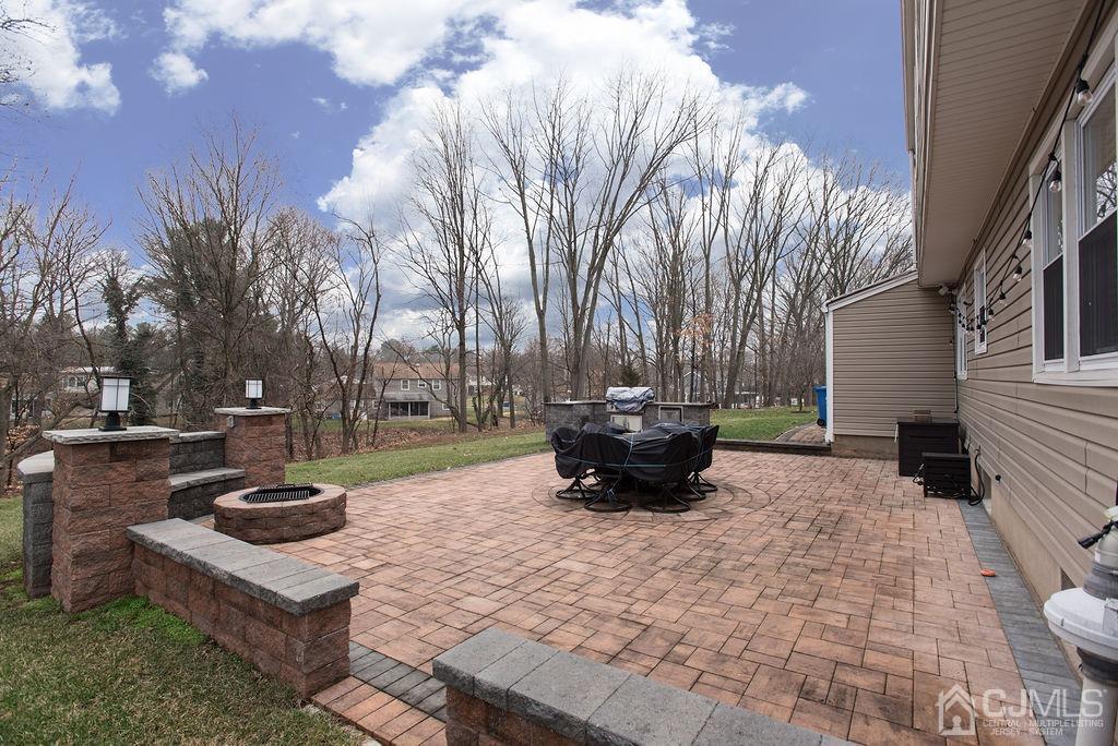18 Layne Road Somerset, NJ 08873 - Photo 21 of 22 a view of a backyard with sitting area