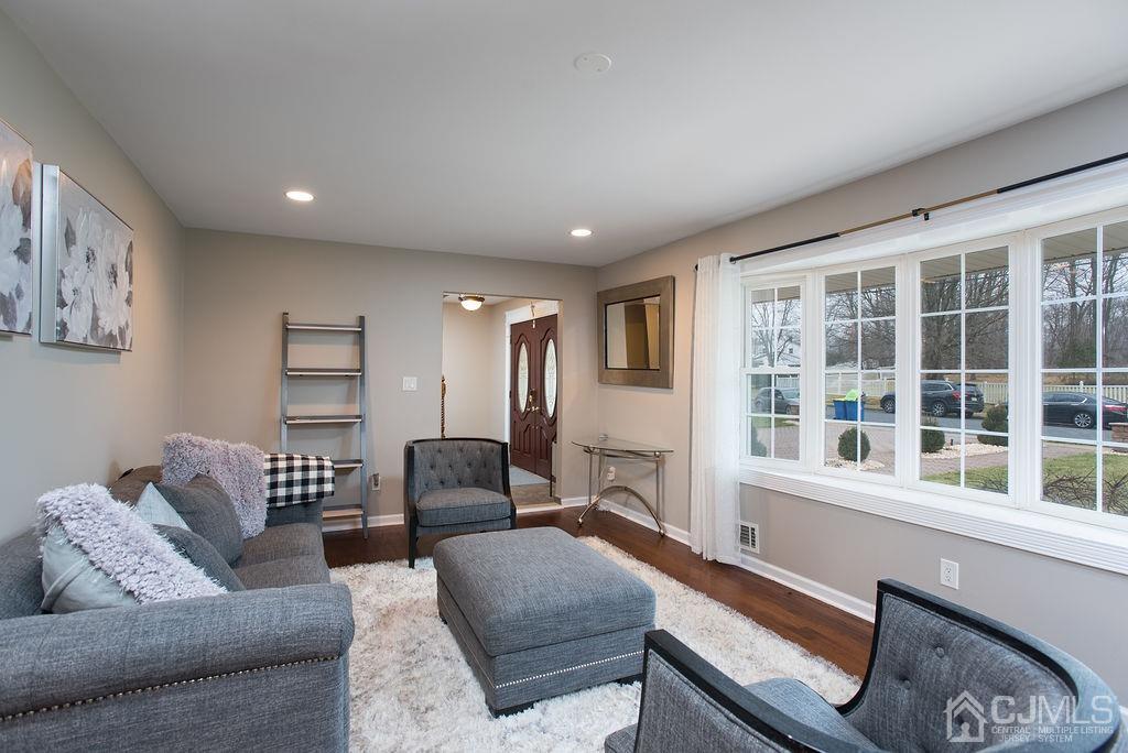 18 Layne Road Somerset, NJ 08873 - Photo 4 of 22 a living room with furniture and a large window