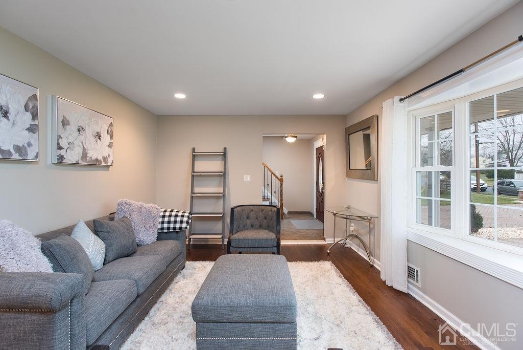 18 Layne Road Somerset, NJ 08873 - Photo 5 of 22 a living room with furniture and large windows