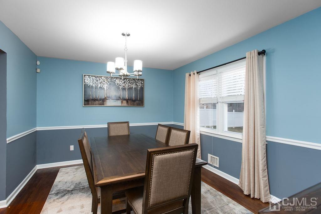 18 Layne Road Somerset, NJ 08873 - Photo 9 of 22 a view of a dining room with furniture window and outside view