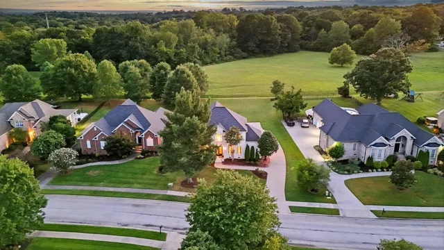 an aerial view of a house with a garden