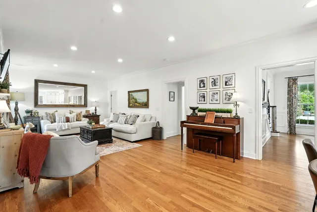a living room with furniture fireplace and a flat screen tv