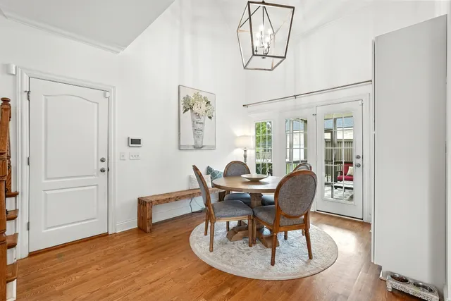 a view of a patio with a table and chairs