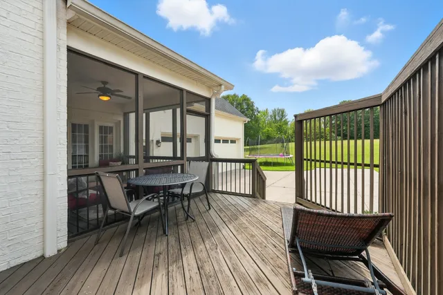 a spacious bedroom with a large bed and a couch