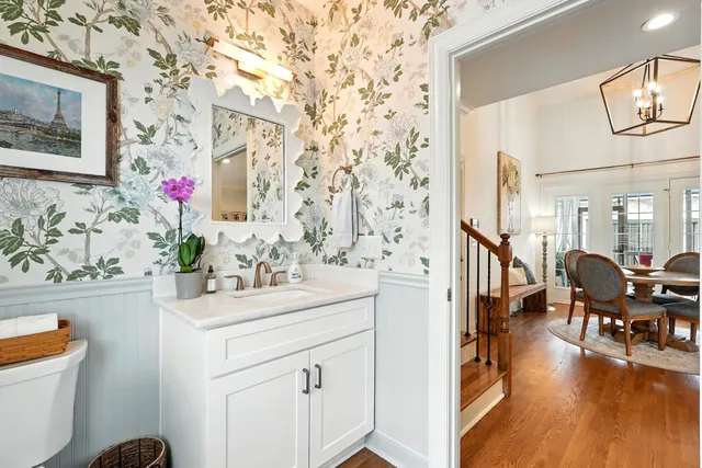 a bathroom with a sink and mirror