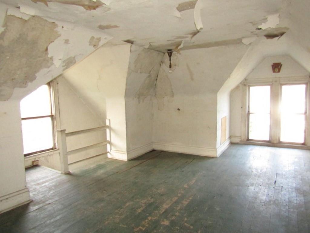 1219 Tweed Street Pittsburgh, PA 15204 - Photo 30 of 30 wooden floor in an empty room with a window