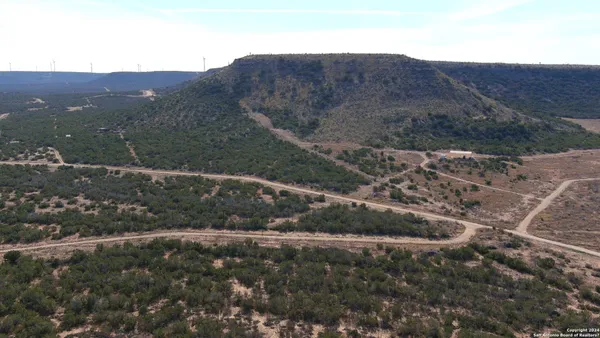 a view of a house with a mountain