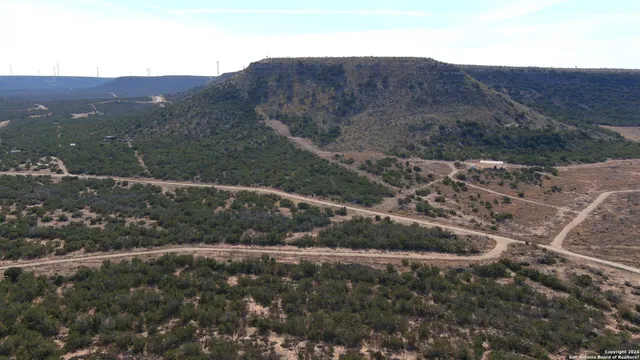 a view of a house with a mountain