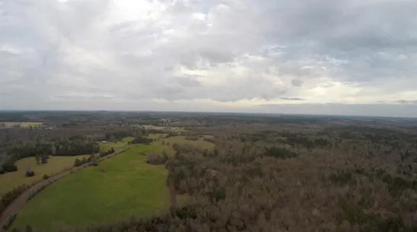 an aerial view of residential house with outdoor space