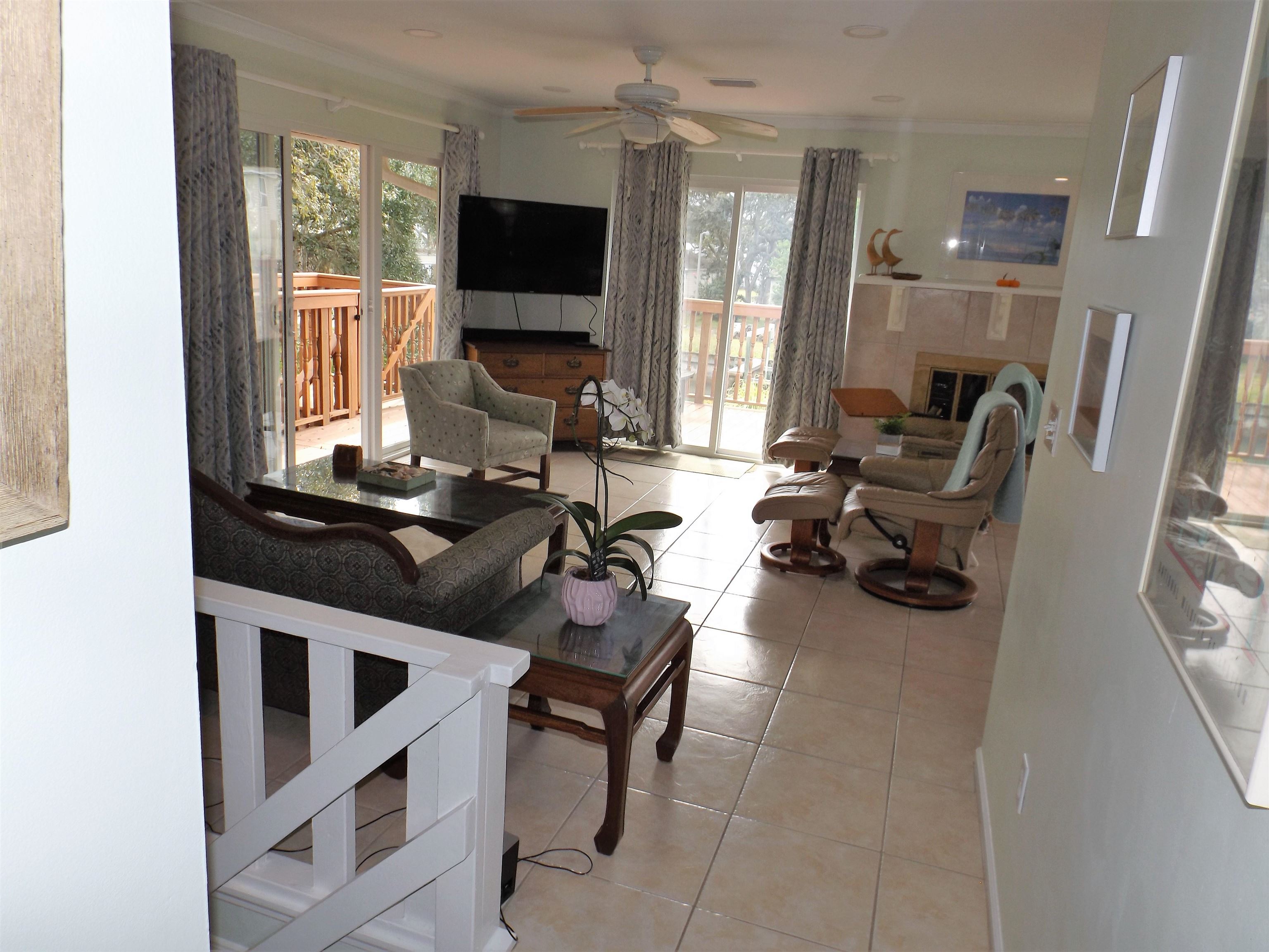 237 Villa Verda Road St. Augustine, FL 32080 - Photo 17 of 48 a view of a livingroom with workspace and a window