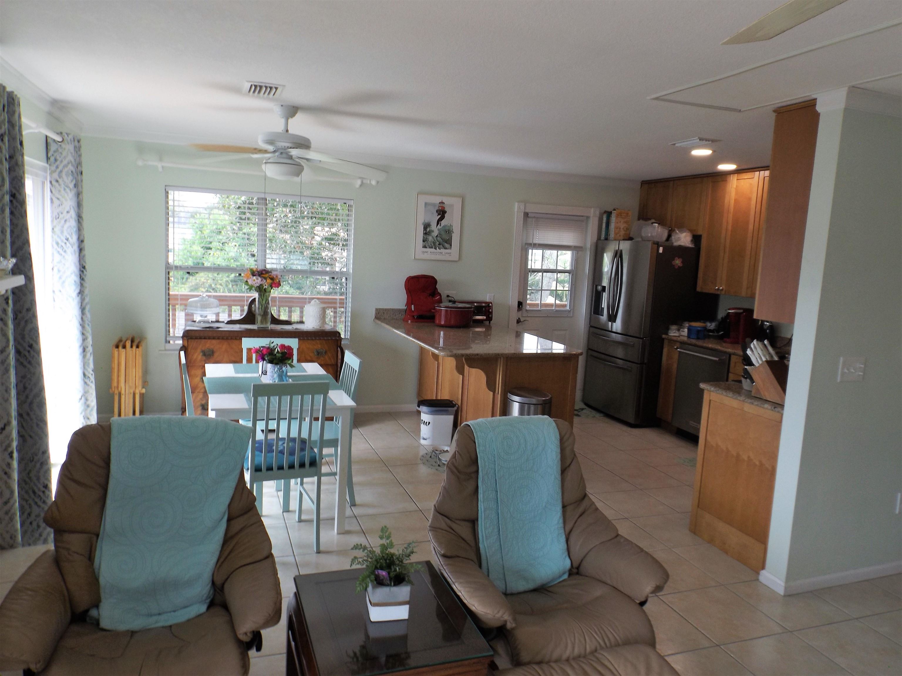 237 Villa Verda Road St. Augustine, FL 32080 - Photo 18 of 48 a view of a dining room with furniture window and outside view