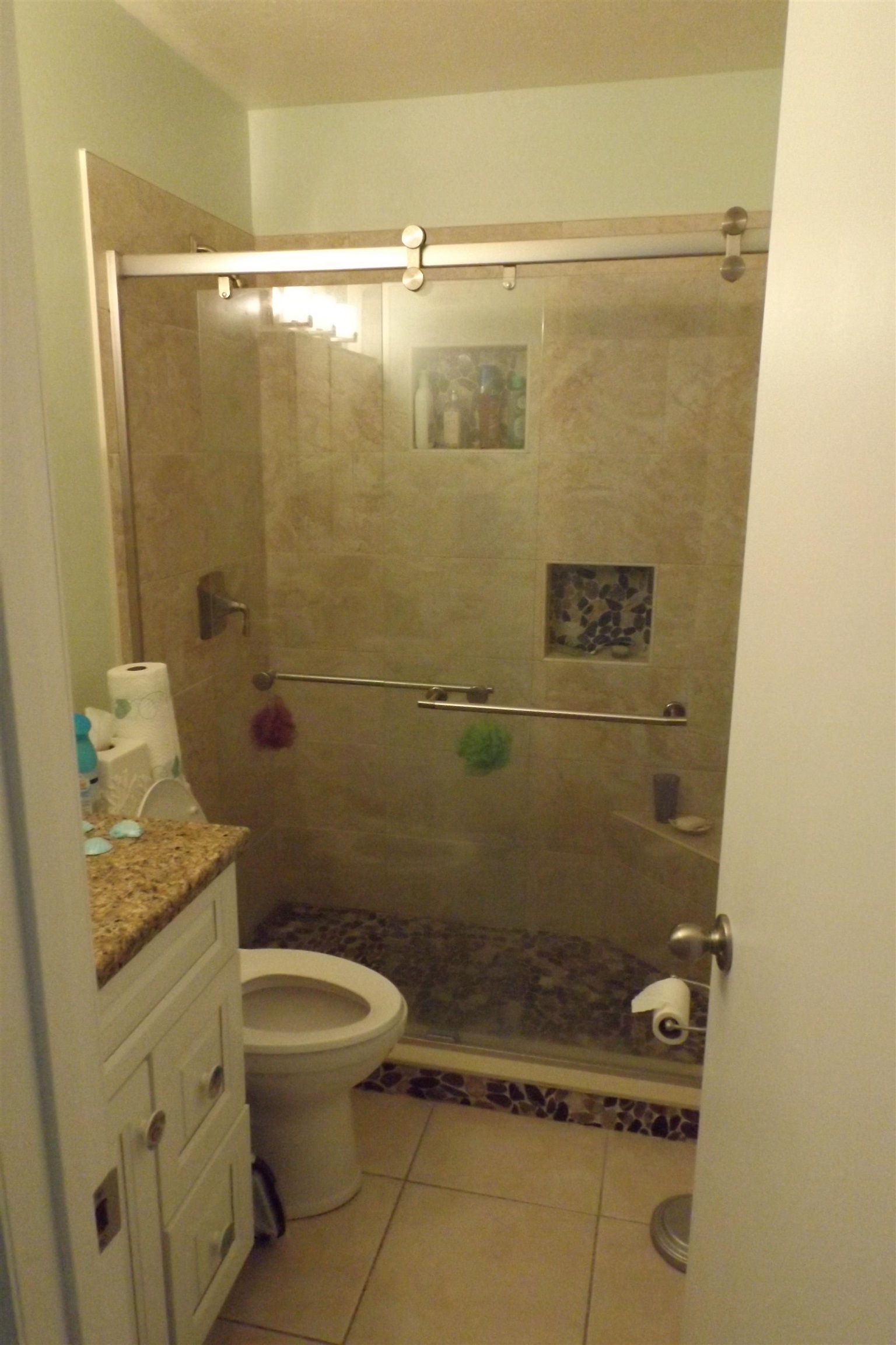 237 Villa Verda Road St. Augustine, FL 32080 - Photo 21 of 48 a bathroom with a shower a toilet and a sink