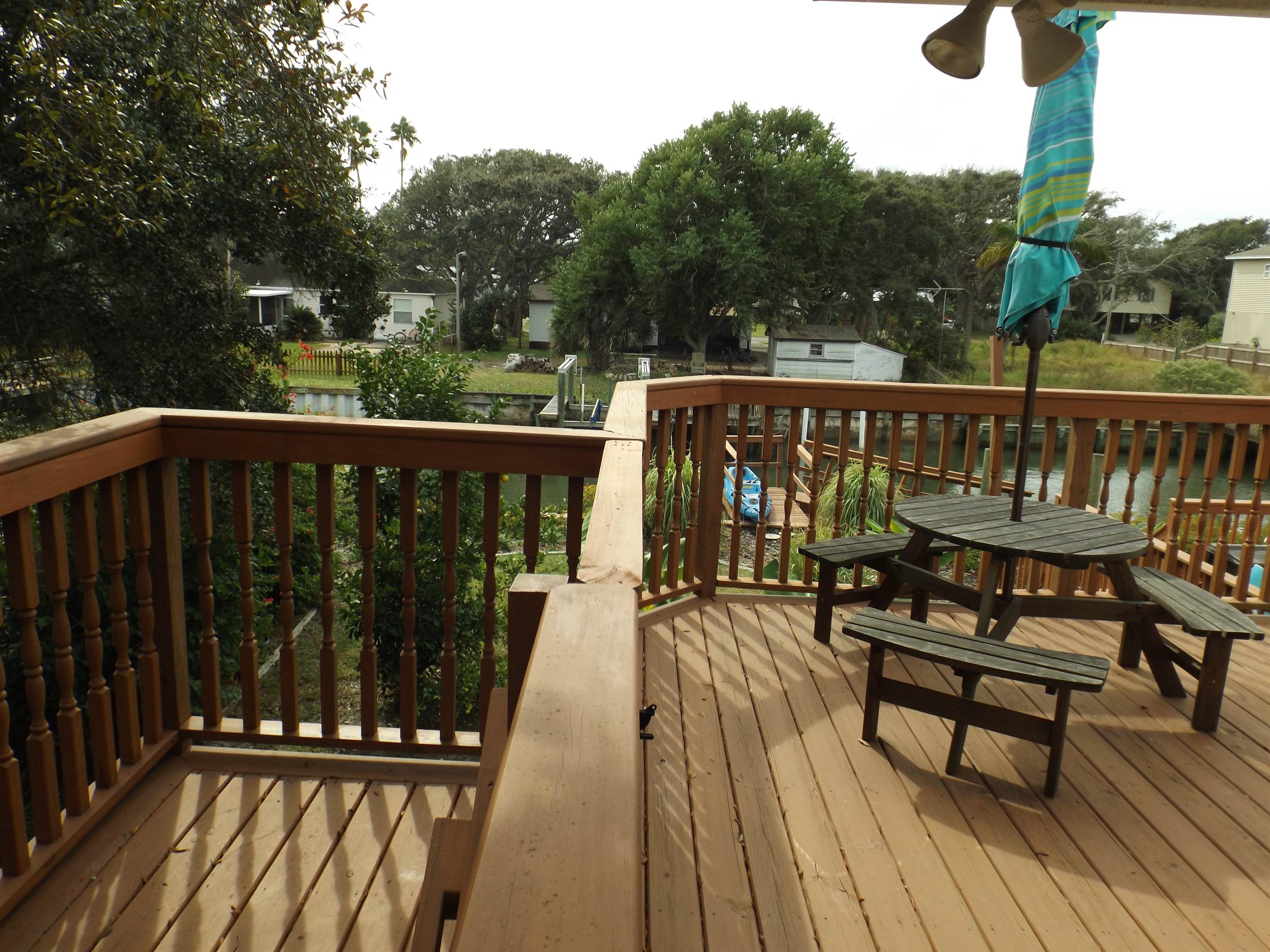 237 Villa Verda Road St. Augustine, FL 32080 - Photo 7 of 48 a view of wooden deck with a table