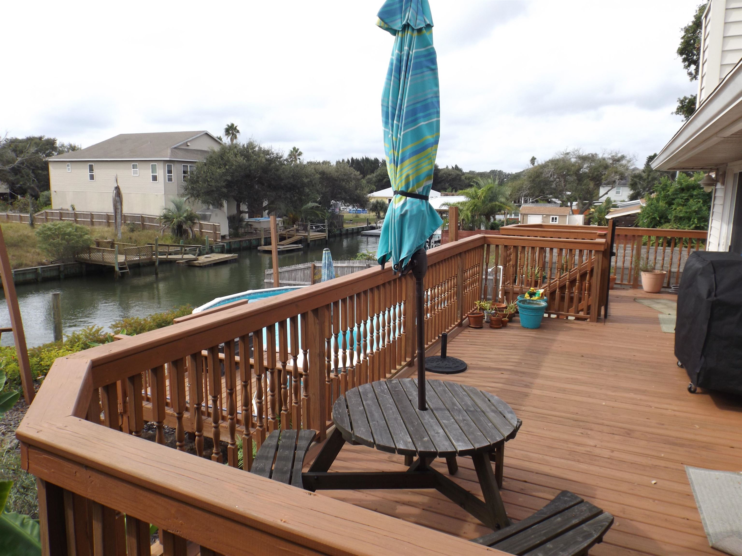 237 Villa Verda Road St. Augustine, FL 32080 - Photo 9 of 48 a view of a balcony with lake view and wooden floor