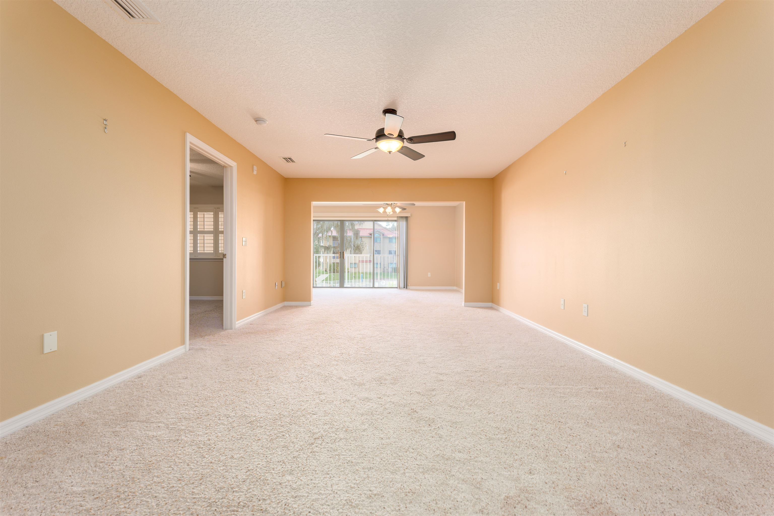 99 Broad River Place, Unit 3205 Welaka, FL 32193 - Photo 12 of 33 a view of an empty room with a window