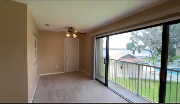 a view of a room with a large window