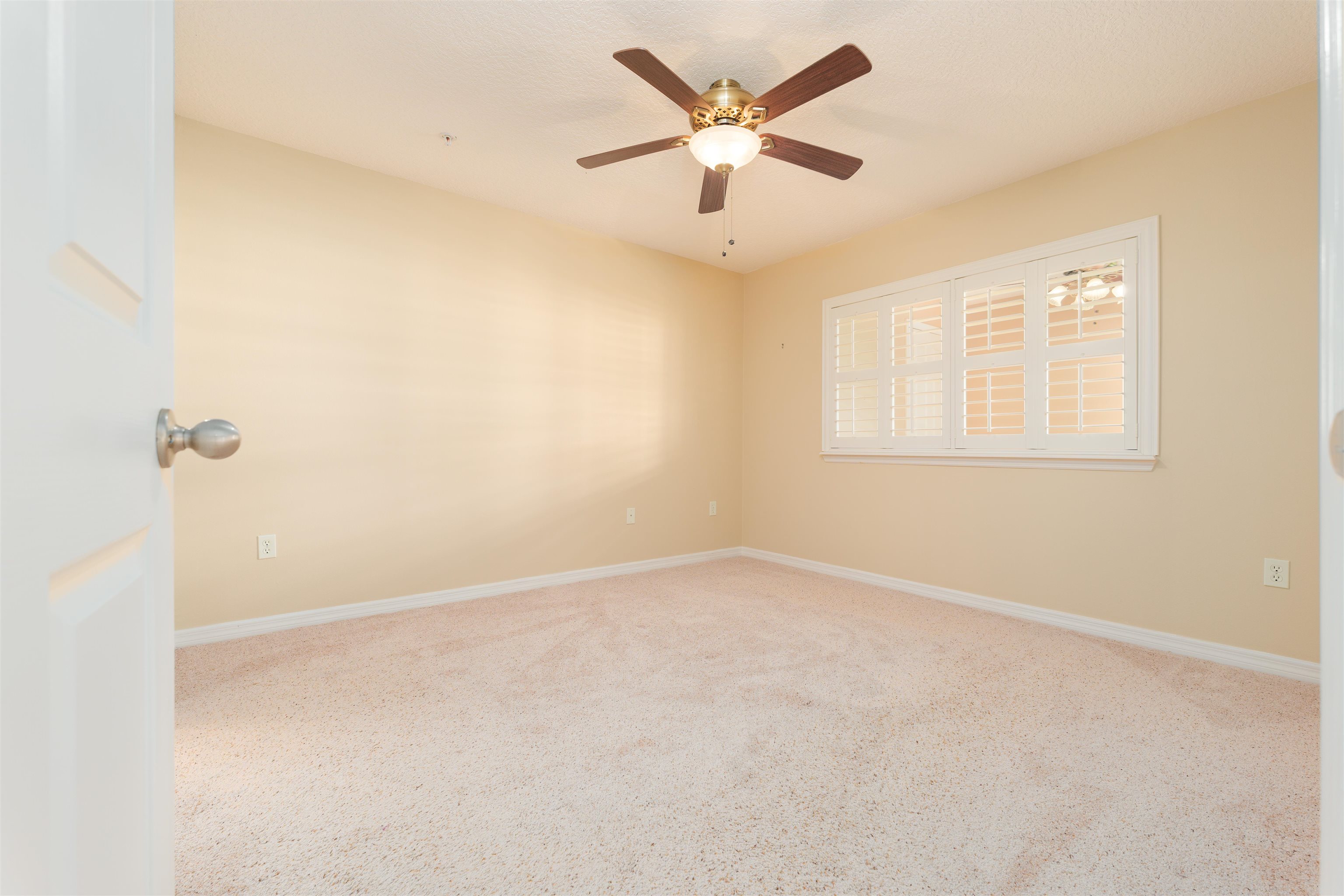 99 Broad River Place, Unit 3205 Welaka, FL 32193 - Photo 19 of 33 an empty room with a window and a fan