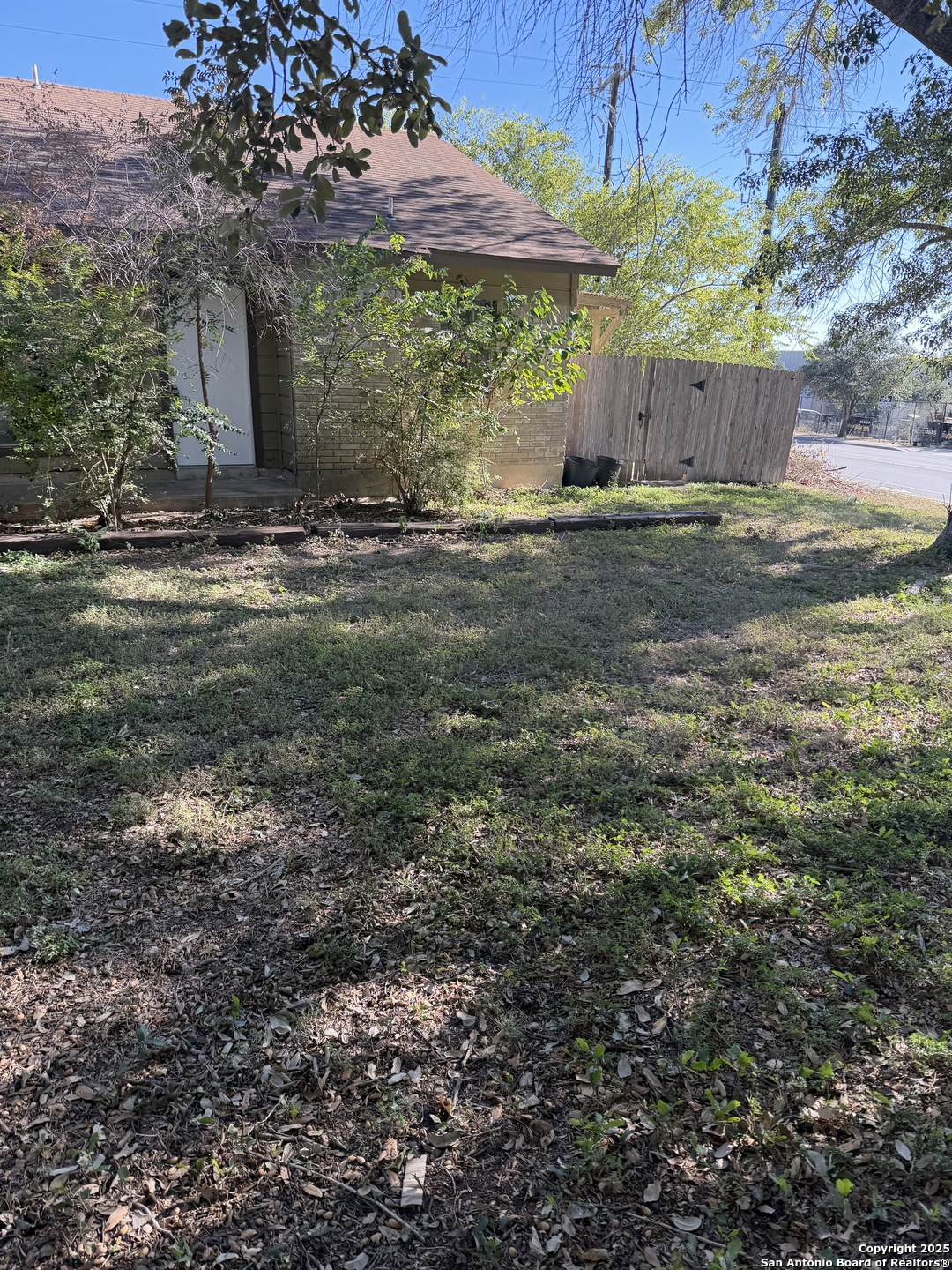 a view of a yard with an outdoor space