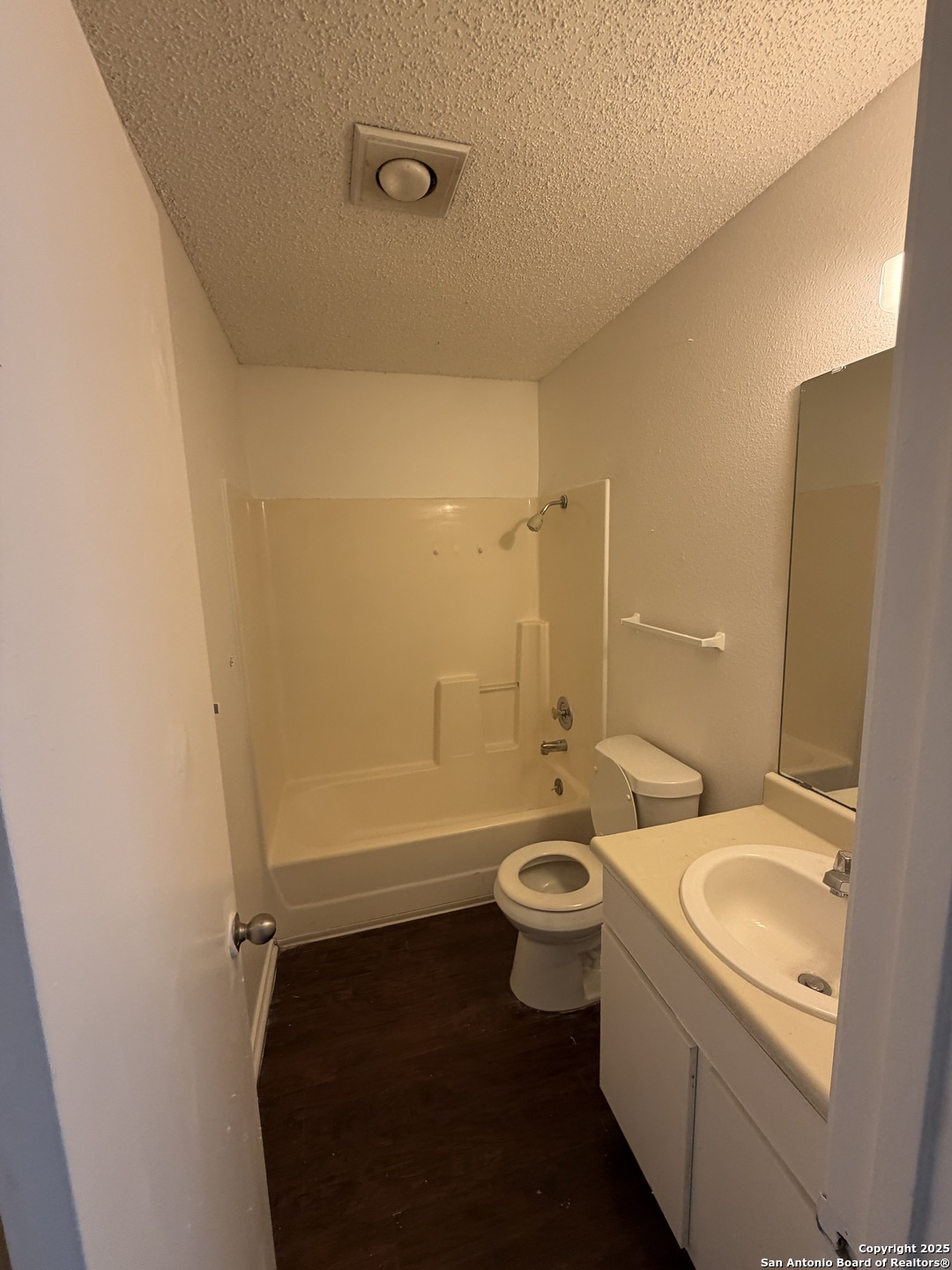 12200 Ridge Crown Street San Antonio, TX 78247 - Photo 17 of 20 a bathroom with a granite countertop sink toilet and shower