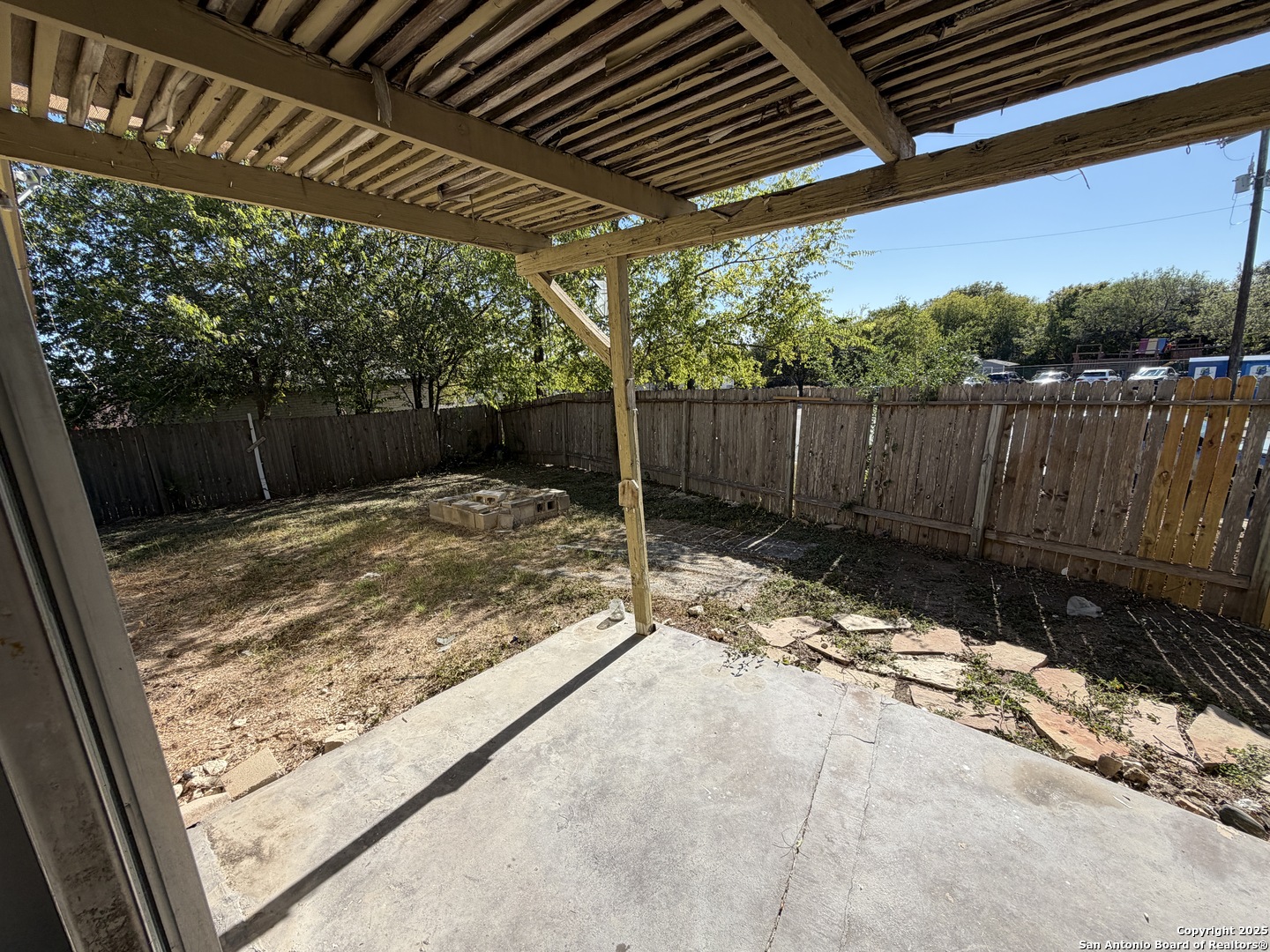 12200 Ridge Crown Street San Antonio, TX 78247 - Photo 20 of 20 a view of a backyard of a house