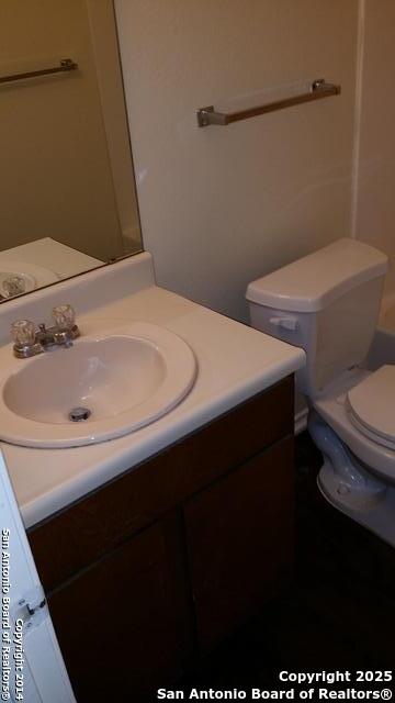 12200 Ridge Crown Street San Antonio, TX 78247 - Photo 5 of 20 a bathroom with a sink and a toilet