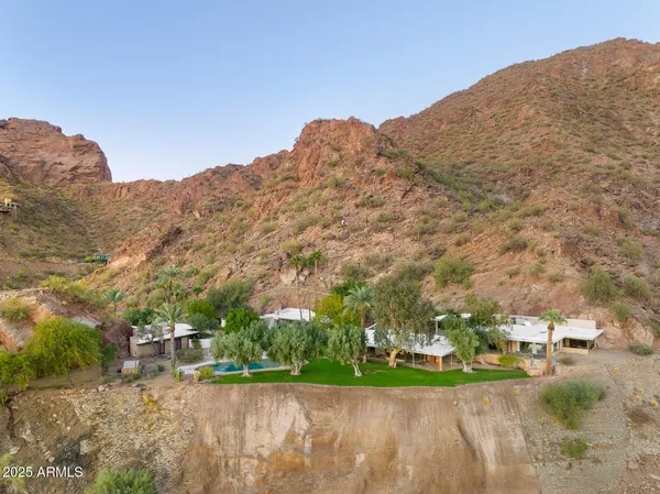 a view of a town with mountains in the background