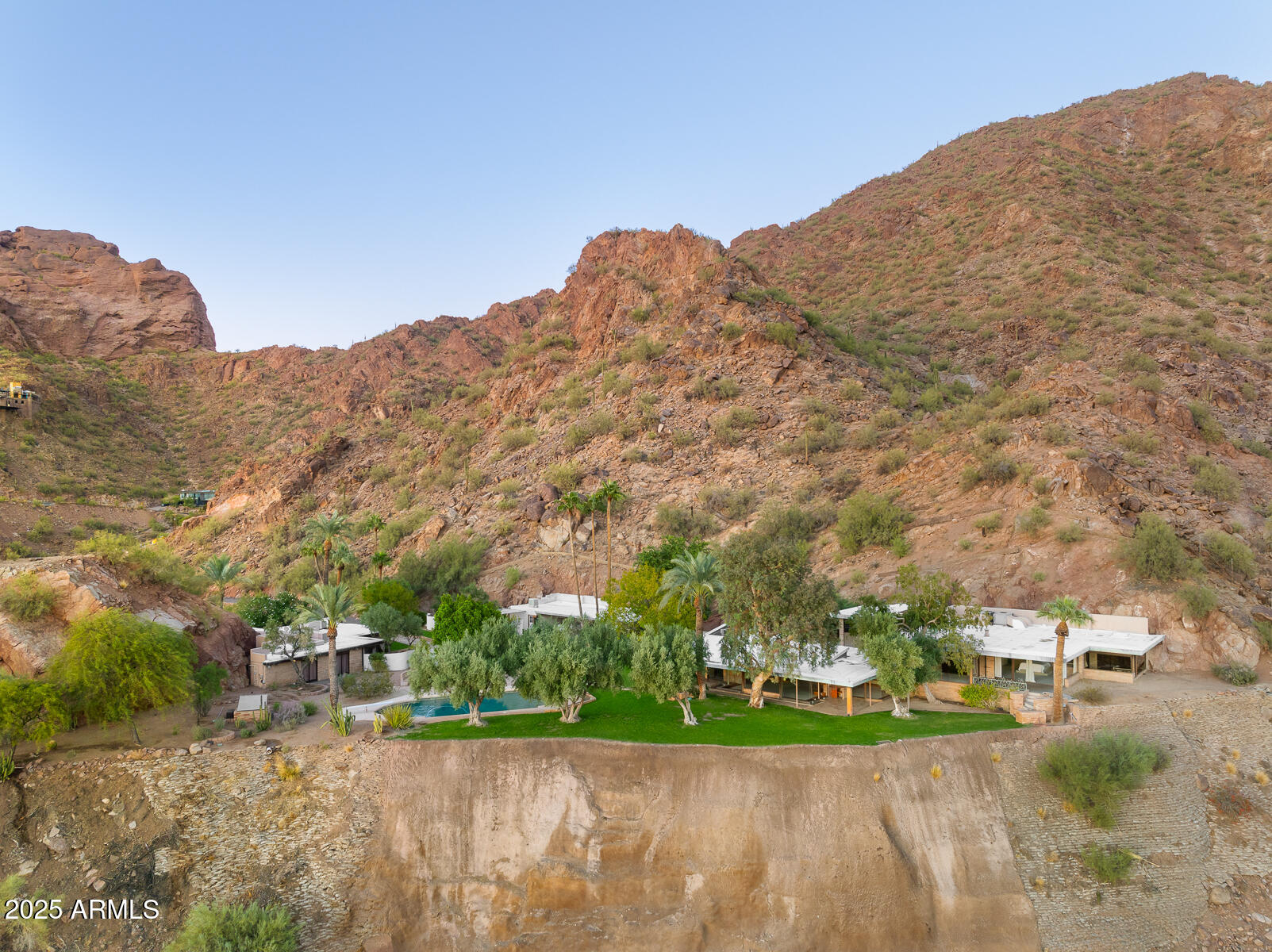 5500 North Dromedary Road, Unit V Phoenix, AZ 85251 - Photo 14 of 26 a view of a town with mountains in the background