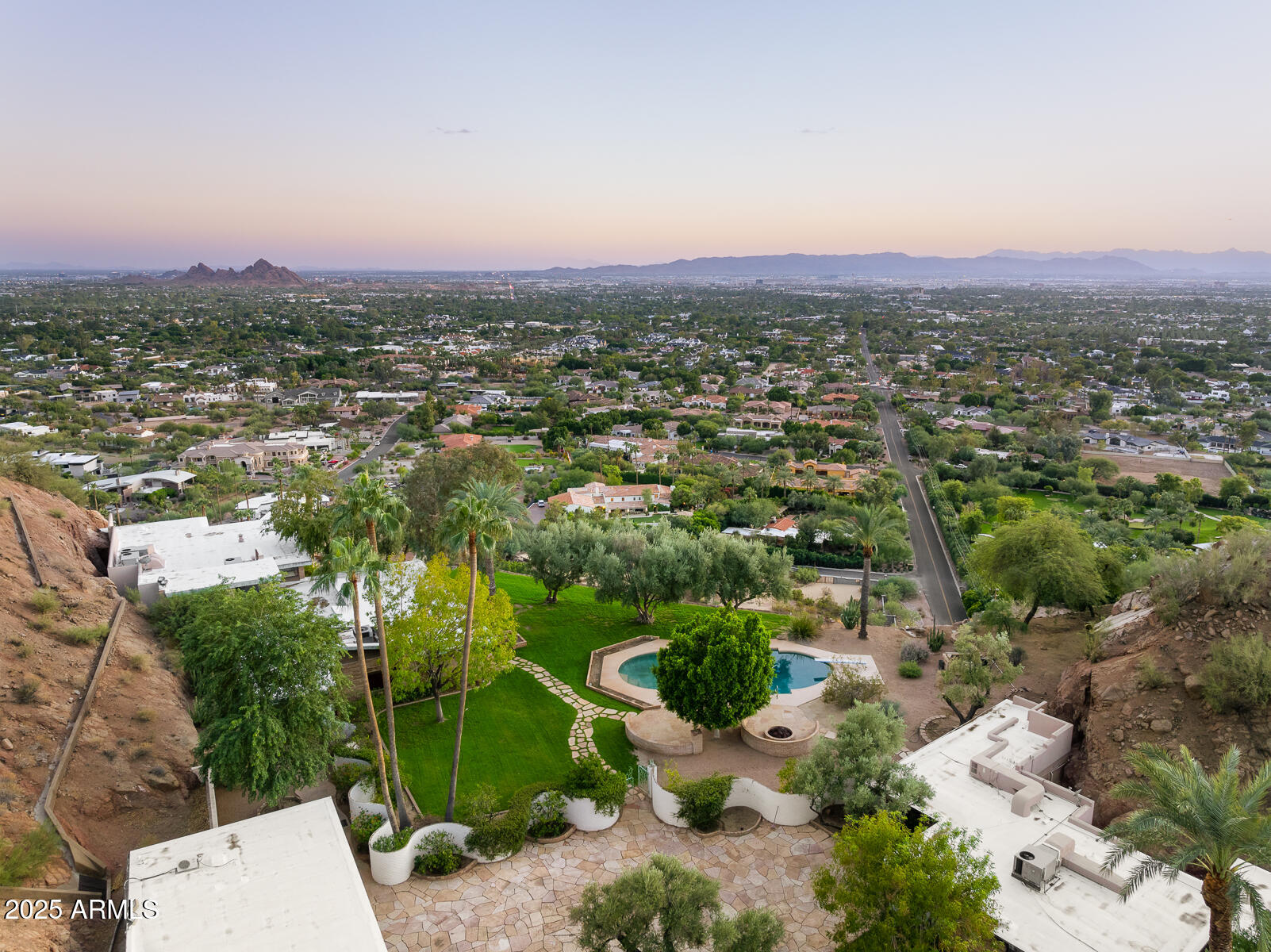 5500 North Dromedary Road, Unit V Phoenix, AZ 85251 - Photo 16 of 26 an aerial view of multiple house