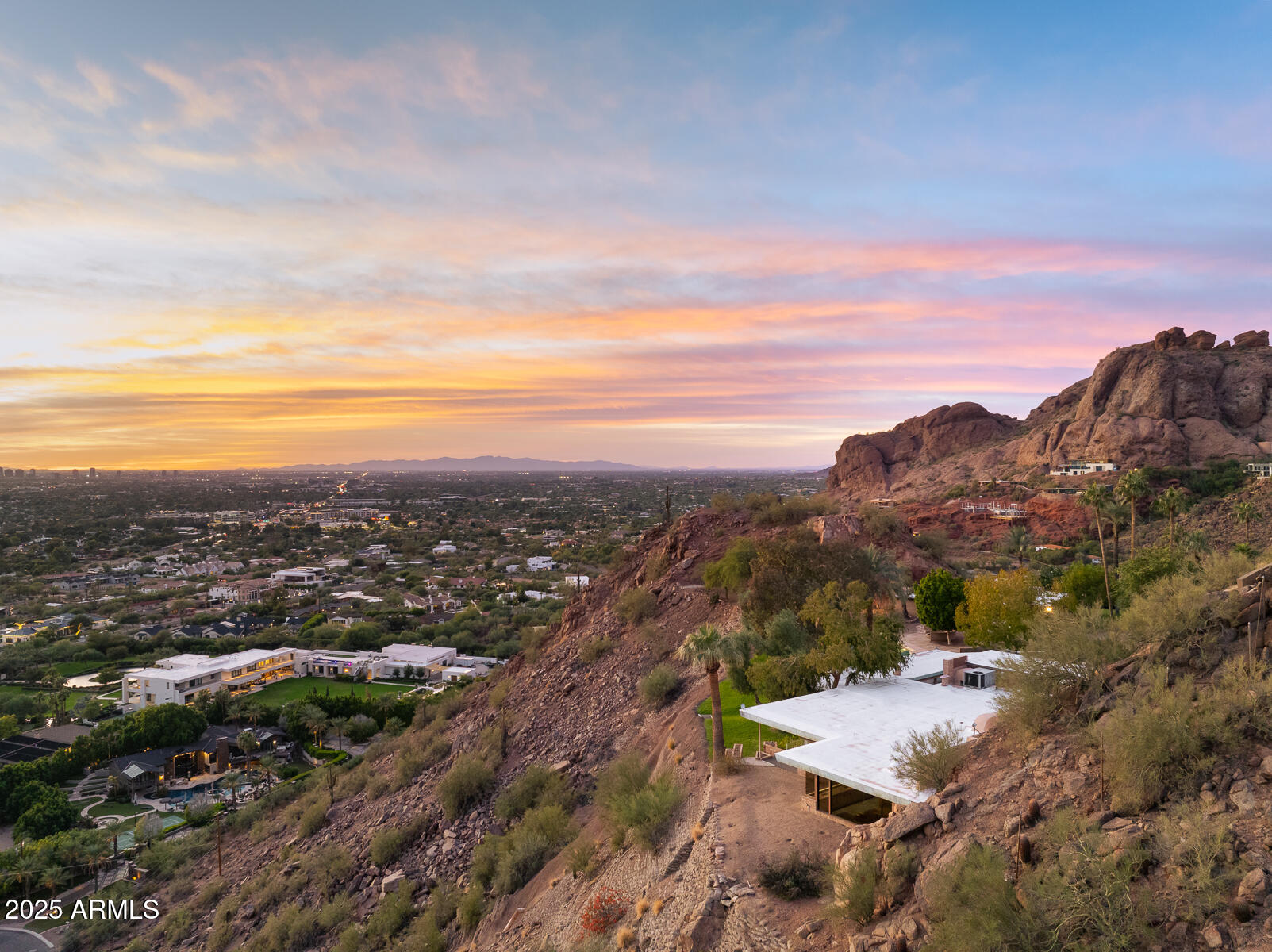 5500 North Dromedary Road, Unit V Phoenix, AZ 85251 - Photo 17 of 26 a view of a city with mountains in the background