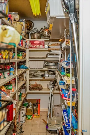 a utility room with sink dryer and washer