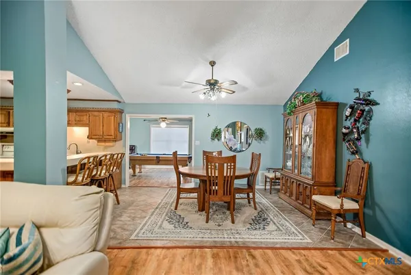 a view of a dining room with furniture