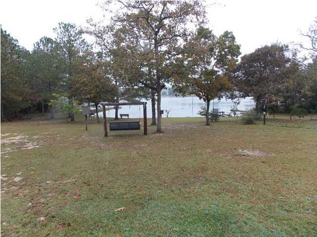 731 Paul Road DeFuniak Springs, FL 32433 - Photo 11 of 14 a view of a tree in front of a house