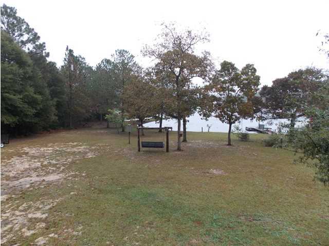 731 Paul Road DeFuniak Springs, FL 32433 - Photo 14 of 14 a view of outdoor space with trees