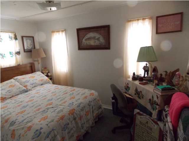 731 Paul Road DeFuniak Springs, FL 32433 - Photo 6 of 14 a bedroom with a bed and a window