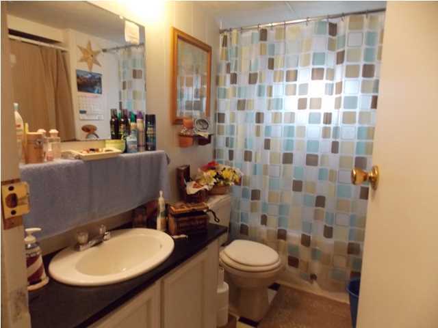 731 Paul Road DeFuniak Springs, FL 32433 - Photo 8 of 14 a bathroom with a sink a toilet and shower