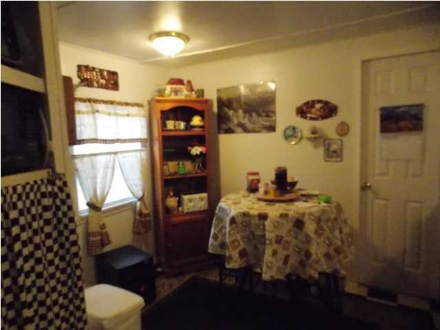 731 Paul Road DeFuniak Springs, FL 32433 - Photo 10 of 14 a bedroom with a bed and a window