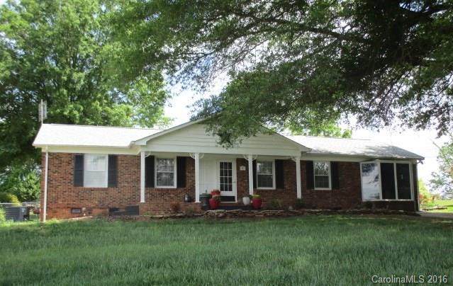 732 Ike Lynch Road Dallas, NC 28034 - Photo 1 of 24 a front view of a house with a garden