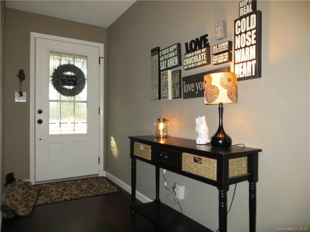 732 Ike Lynch Road Dallas, NC 28034 - Photo 2 of 24 a view of entryway and hall with wooden floor