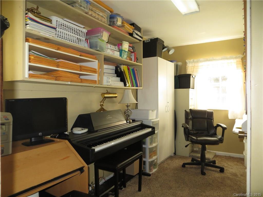 732 Ike Lynch Road Dallas, NC 28034 - Photo 19 of 24 a view of a workspace with furniture