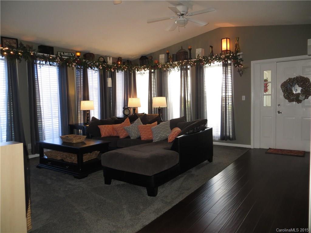 732 Ike Lynch Road Dallas, NC 28034 - Photo 3 of 24 a living room with furniture and wooden floor
