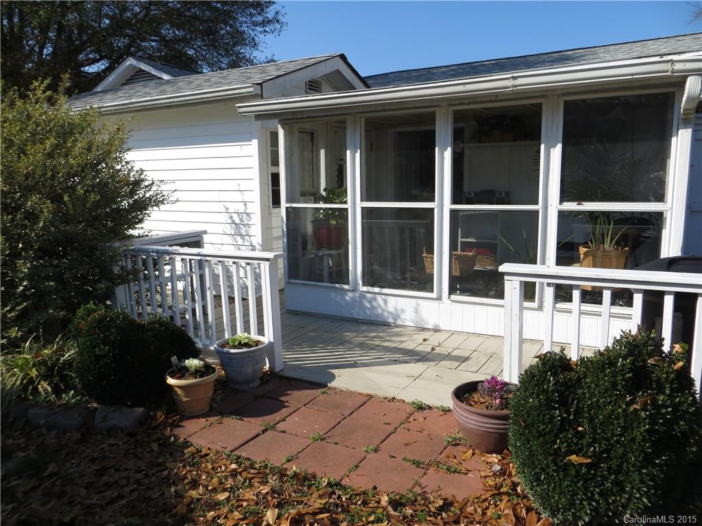 732 Ike Lynch Road Dallas, NC 28034 - Photo 21 of 24 a front view of a house with a porch